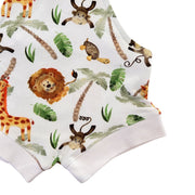 Knot Dungaree - Simba Watercolour white leg cuff and lion, giraffe and monkey print close-up