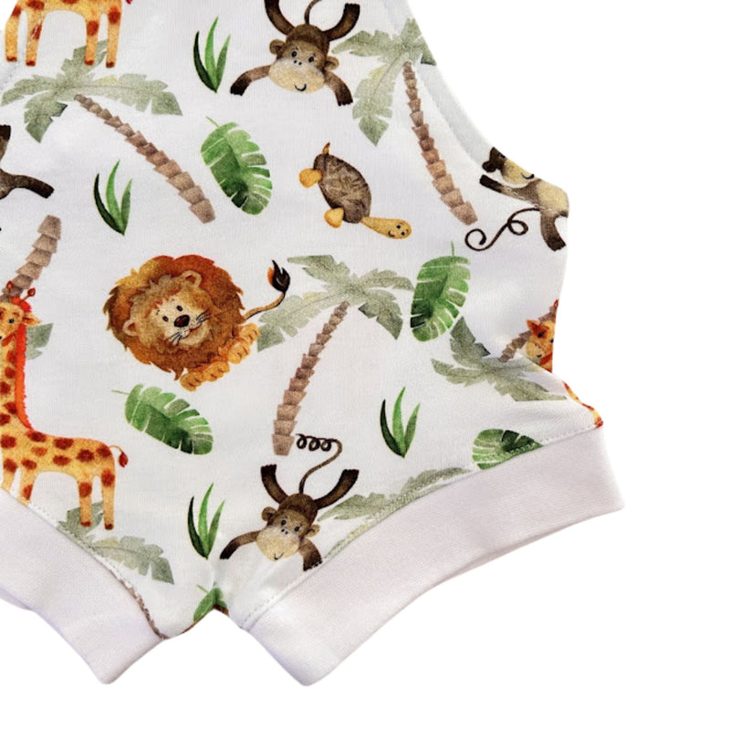 Knot Dungaree - Simba Watercolour white leg cuff and lion, giraffe and monkey print close-up