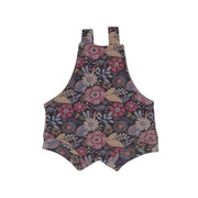 Floral patterned romper on a white background