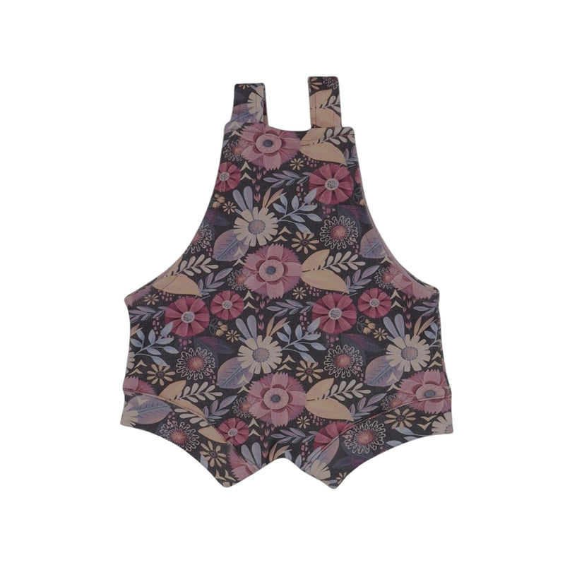 Floral patterned romper on a white background