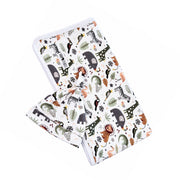 Matching Blanket & Beanie Set - African Plains arranged diagonally, with a knot beanie resting on a white-bound blanket featuring grey elephants, green crocodiles, zebras and rust lions.