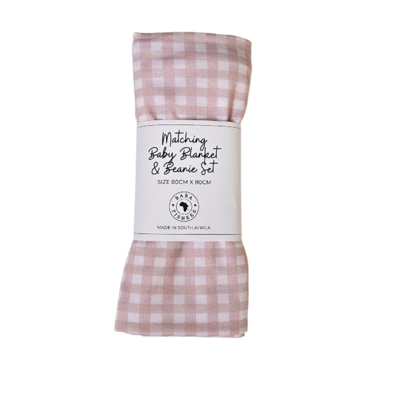 Folded baby blanket and knot beanie set in pink and white checked gingham