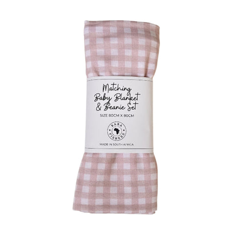 Folded baby blanket and knot beanie set in pink and white checked gingham
