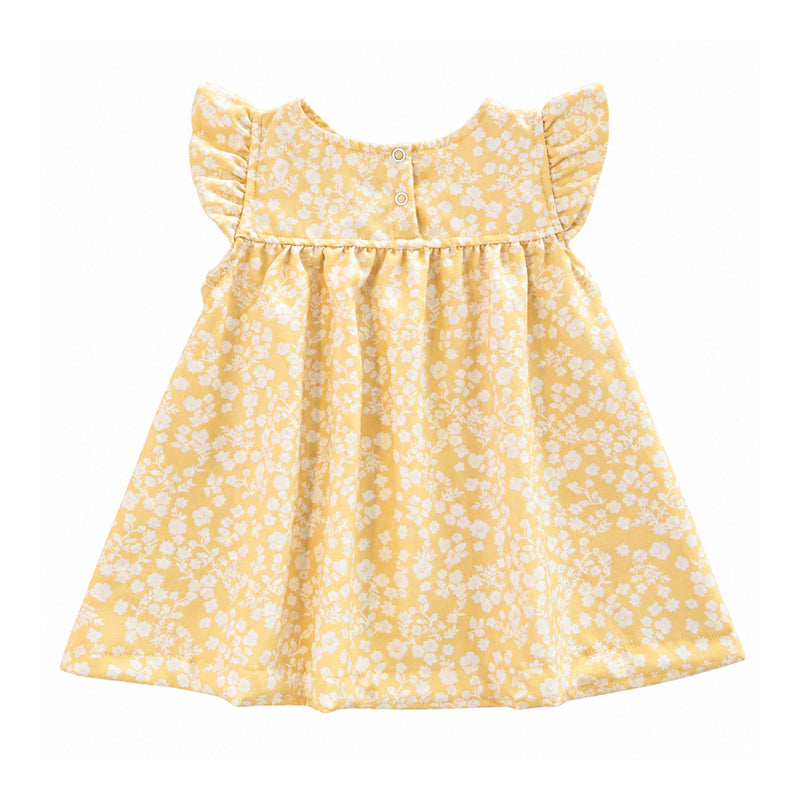 Back view of the pale yellow Mocca Dress with a white floral print, flutter sleeves, two white press studs and a gathered skirt.