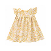 Mocca Dress in pale yellow with a delicate white flower and leaf print, flutter sleeves, a curved neckline and gathered skirt, shown from the front.