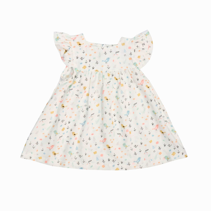 Mocca dress with a tweety bird print in pastel colours on a white background