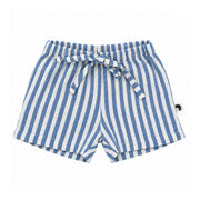 Blue-and-white vertically striped cotton muslin shorts from the Shirt and Shorts Set - Ellie, showing the gathered elasticated waistband, matching bow tie, stitched hems and side label.