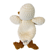 Back view of a crocheted plush duck toy with a textured cream body, a mustard yellow beak, and mustard yellow webbed feet.