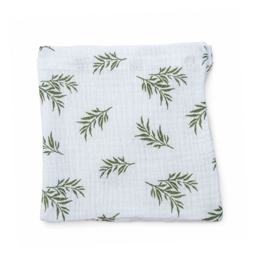 Swaddle Blanket - Wild Olive folded on a white background, showing the soft white double muslin and repeating olive-green leafy branch print