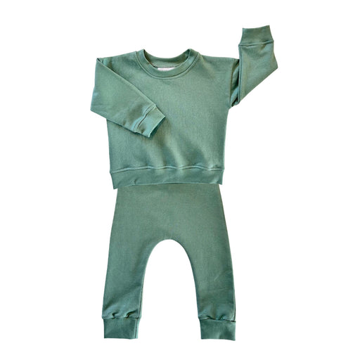 A two-piece children's sweatshirt and cuff pants set in a  sage green colour.