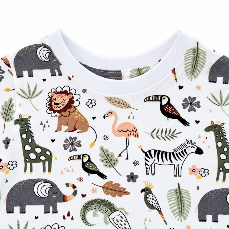 Close-up of Tee Shirt - African Plains showing the white ribbed crew neck and neat stitching above a rust lion, peach flamingo, green giraffe and zebra.