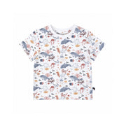 A short-sleeve baby and toddler t-shirt with an all-over underwater-themed print featuring dolphins, sea anemones, starfish, and sponges in muted gray, brown, and beige tones on a white background.