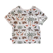 Back view of white Tee Shirt – Two By Two showing the relaxed baggy shape, short sleeves and repeating African animal and tropical palm print