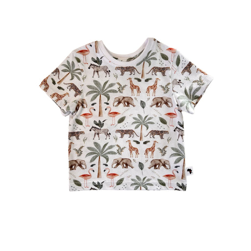 Front view of white Tee Shirt – Two By Two with short sleeves, a white ribbed neckline and an all-over giraffe, elephant, flamingo, zebra, leopard and palm-tree print
