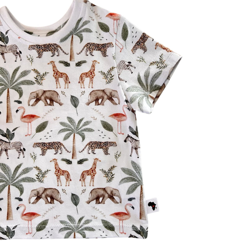 Side close-up of Tee Shirt – Two By Two showing the short sleeve, straight hem, Baba Fishees Africa side label and colourful animal print
