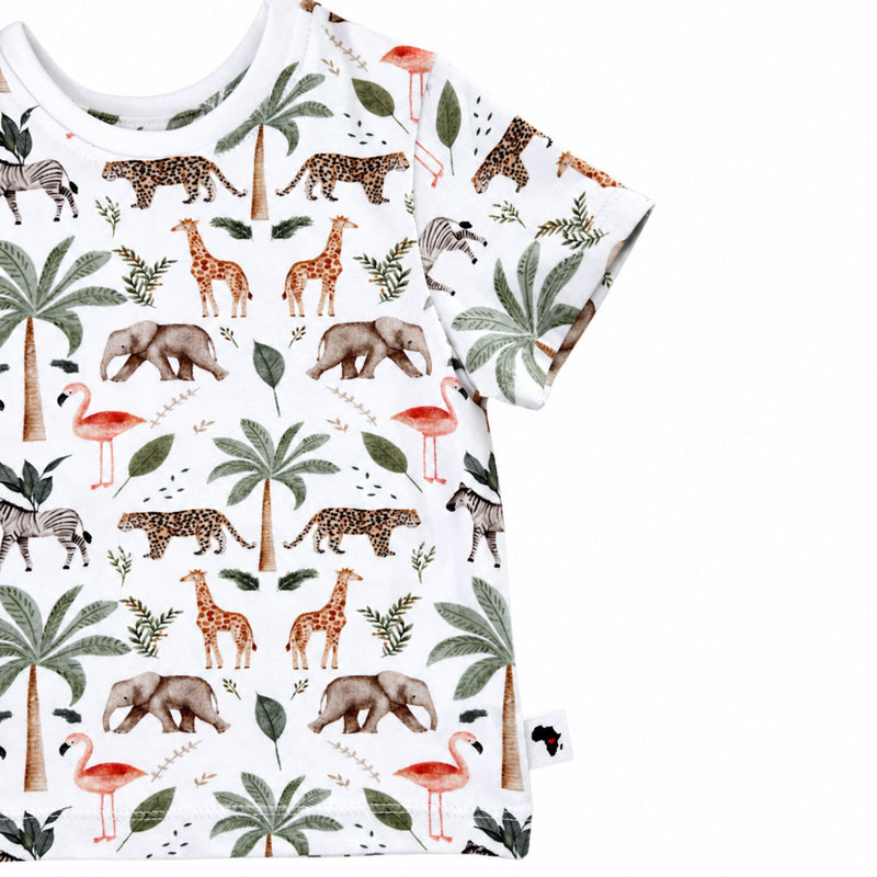 Side close-up of Tee Shirt – Two By Two showing the short sleeve, straight hem, Baba Fishees Africa side label and colourful animal print
