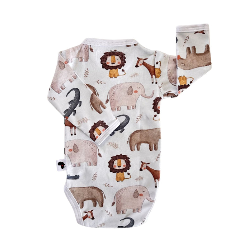 A long-sleeve baby bodysuit with an all-over safari animal print, featuring cartoon lions, elephants, crocodiles and okapi on a white background.